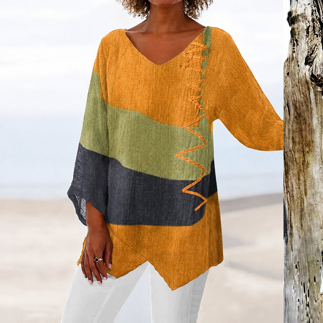 Eli - Farbige Bluse, die locker die Taille umspielt