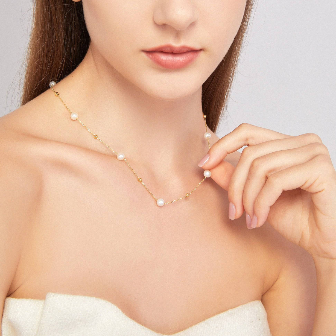Halskette mit Gold und Perlen - abwechselnd Perlen und goldene Glieder