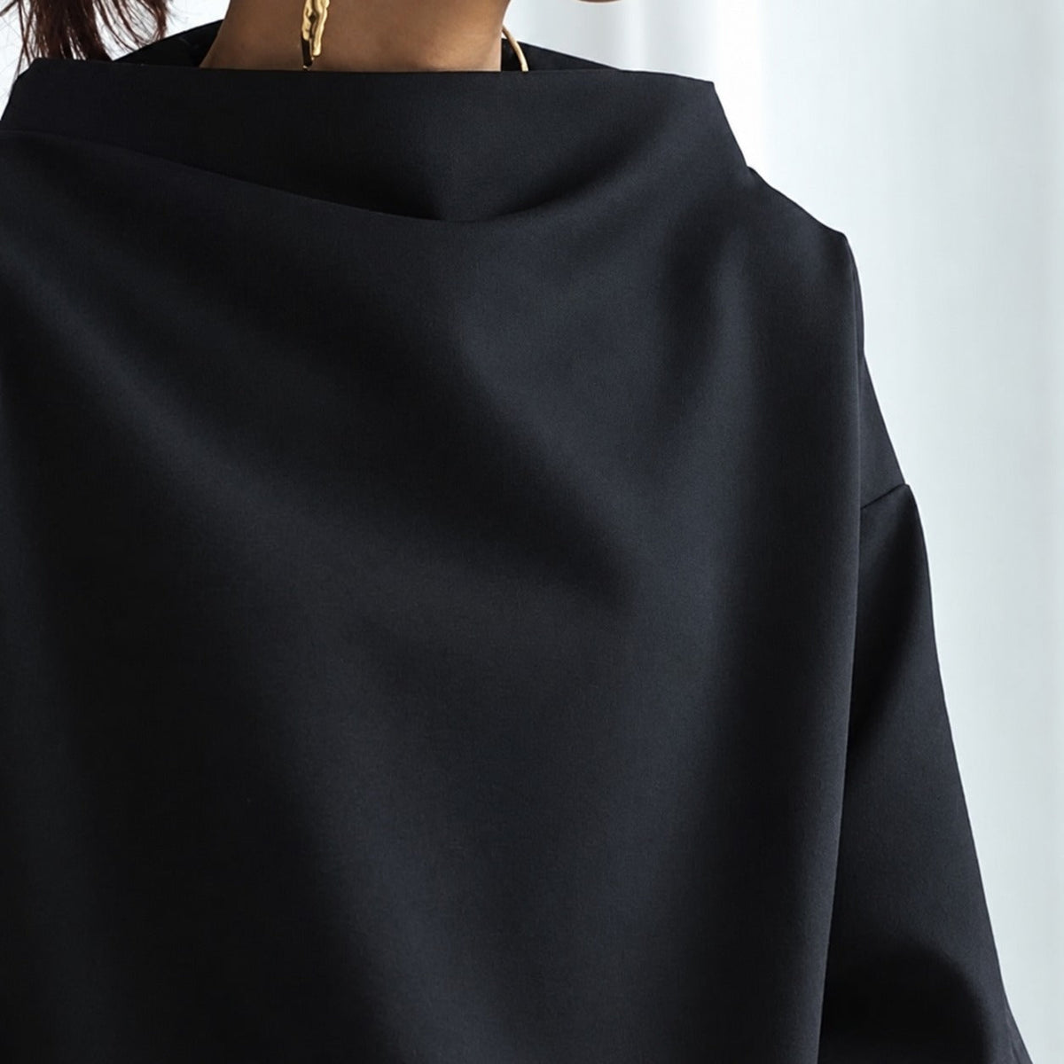 Eliana - Eleganter, locker geschnittener Rollkragenpullover