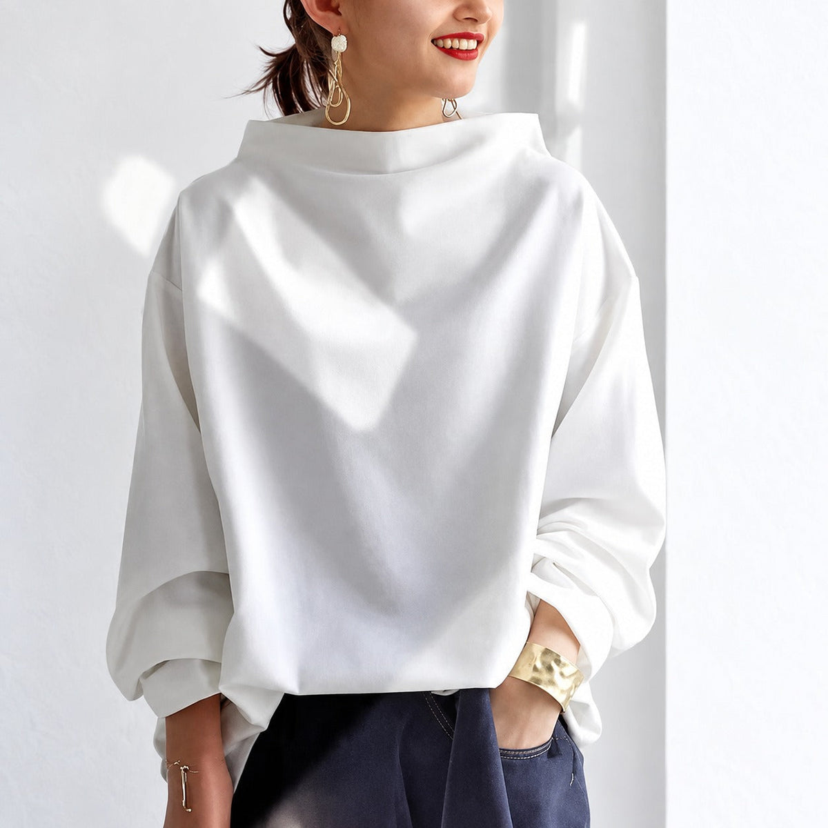 Eliana - Eleganter, locker geschnittener Rollkragenpullover