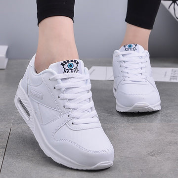 Damenschuhe Sneakers mit Luftpolstersohle und Augengesicht-Motiv