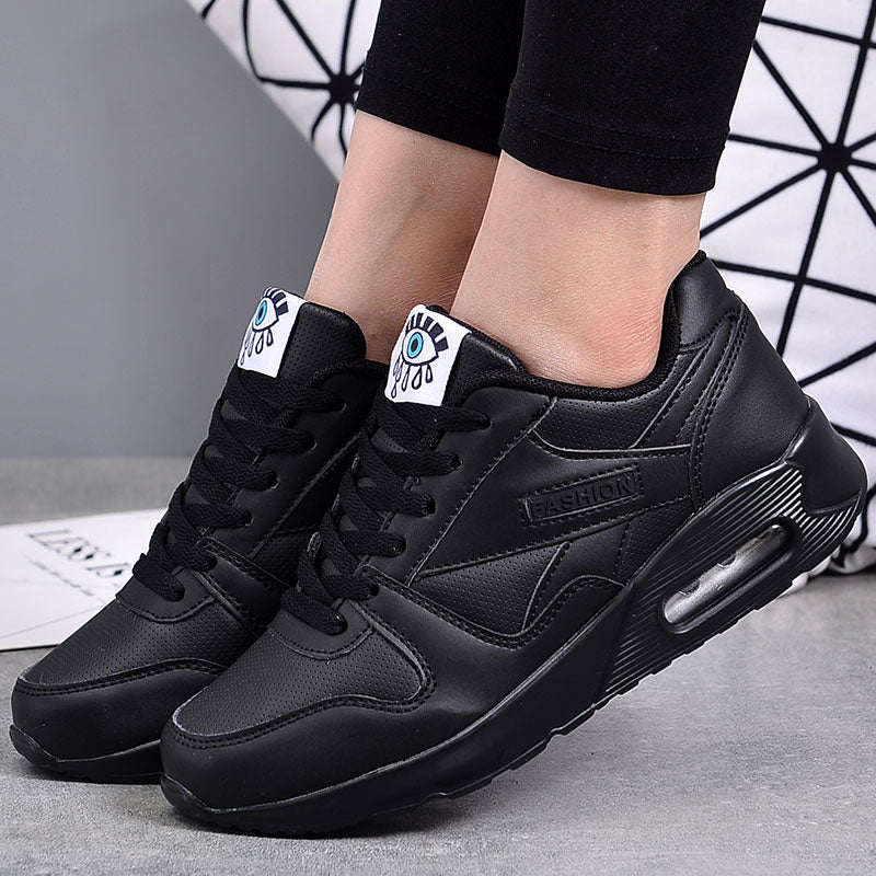 Damenschuhe Sneakers mit Luftpolstersohle und Augengesicht-Motiv