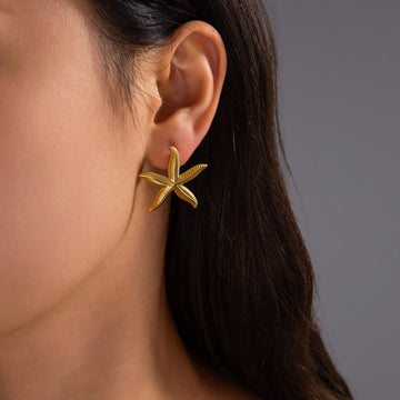 Pien – Ohrringe in Gold in Seesternform
