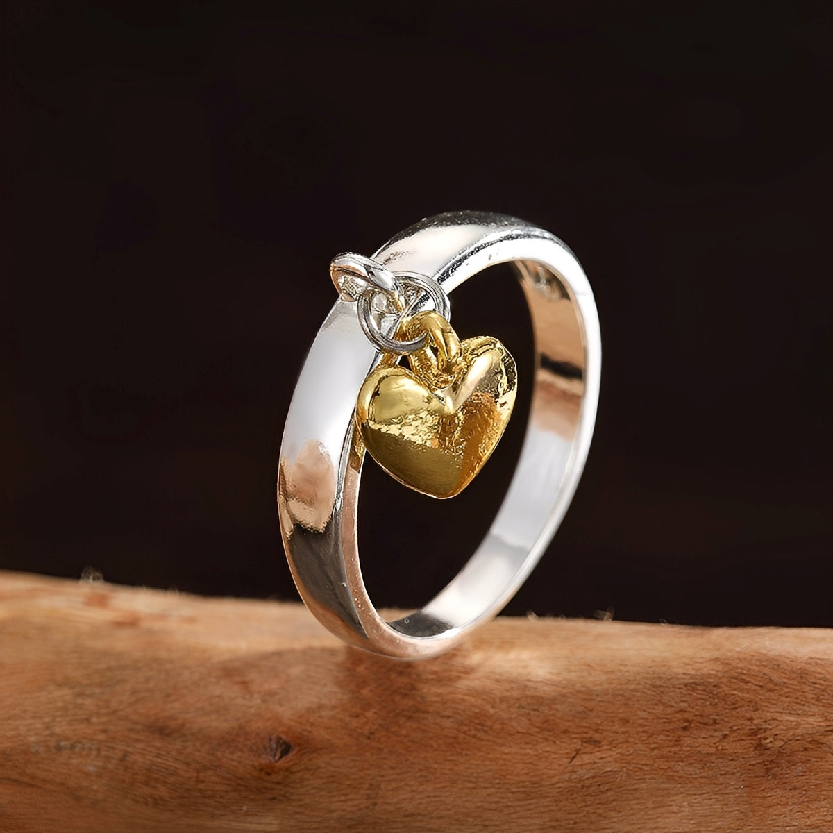 Maelie – Silberring mit einem schwenkbaren Herz im Retro-Stil
