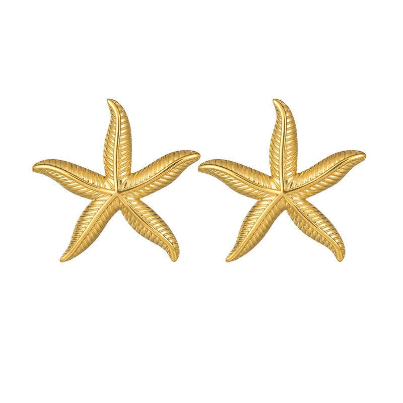 Pien – Ohrringe in Gold in Seesternform